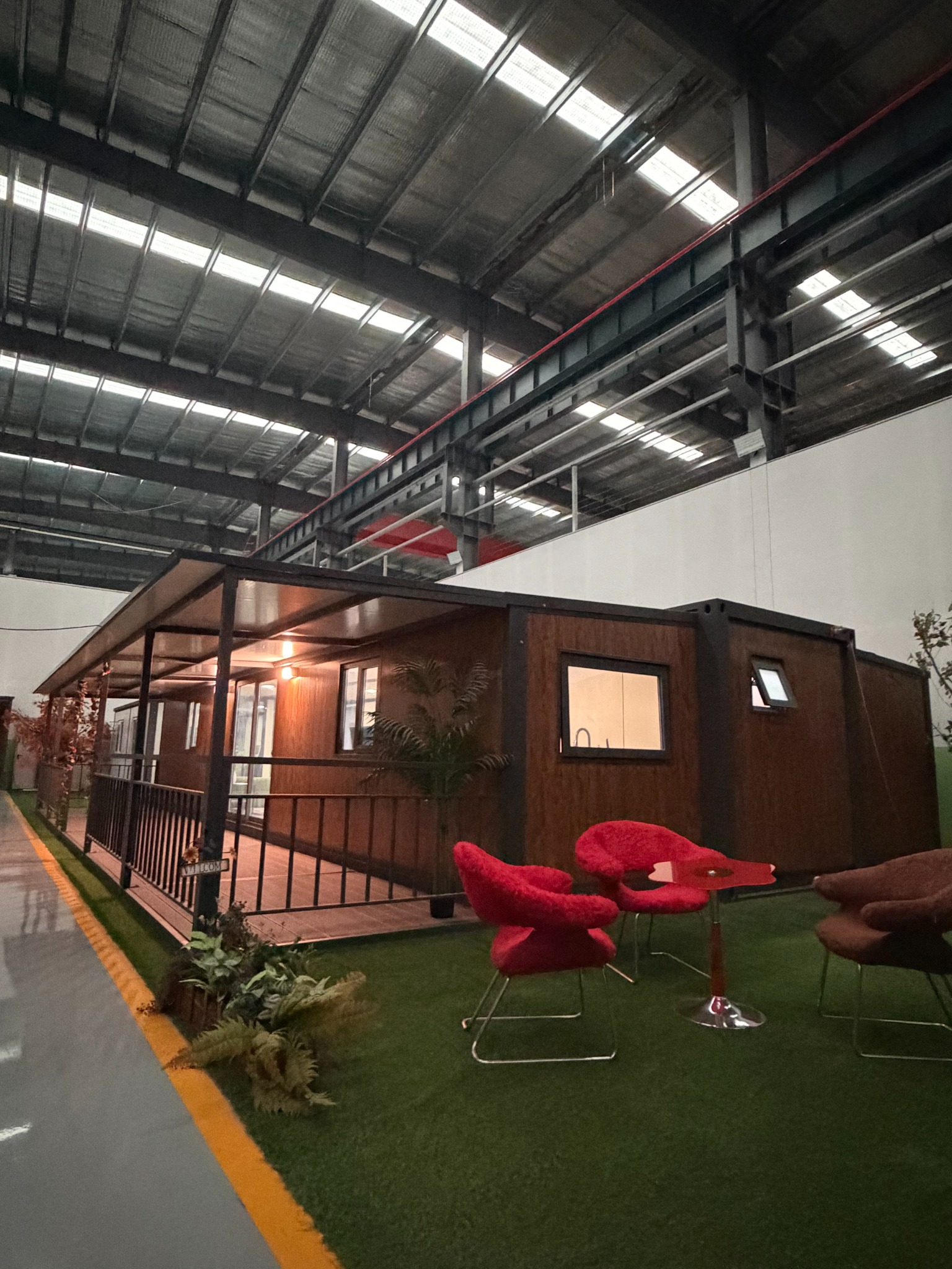Expandable house with timber porch reference