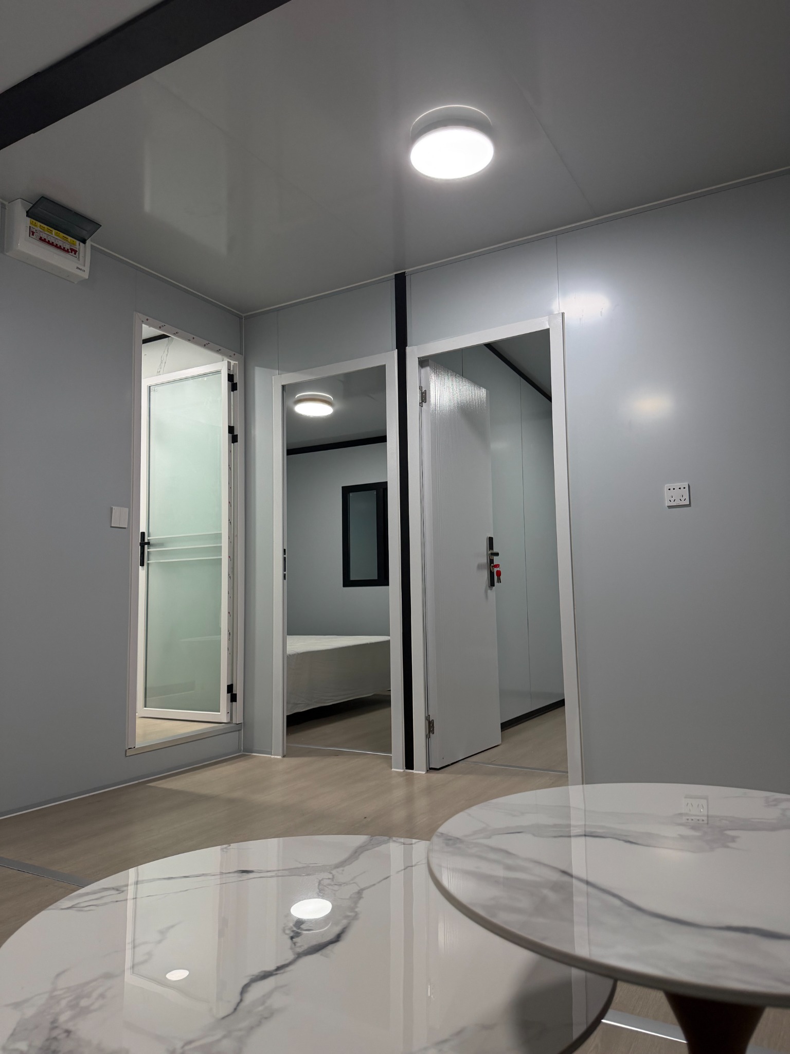 Finished expandable container house interior corridor and doors