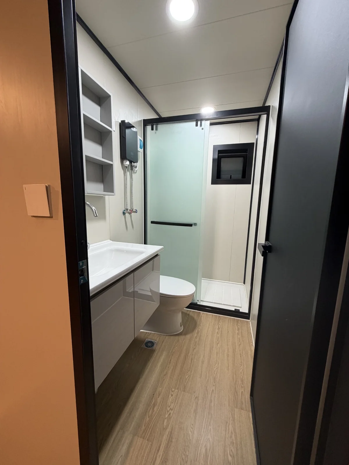 Bathroom in double-storey custom expandable house