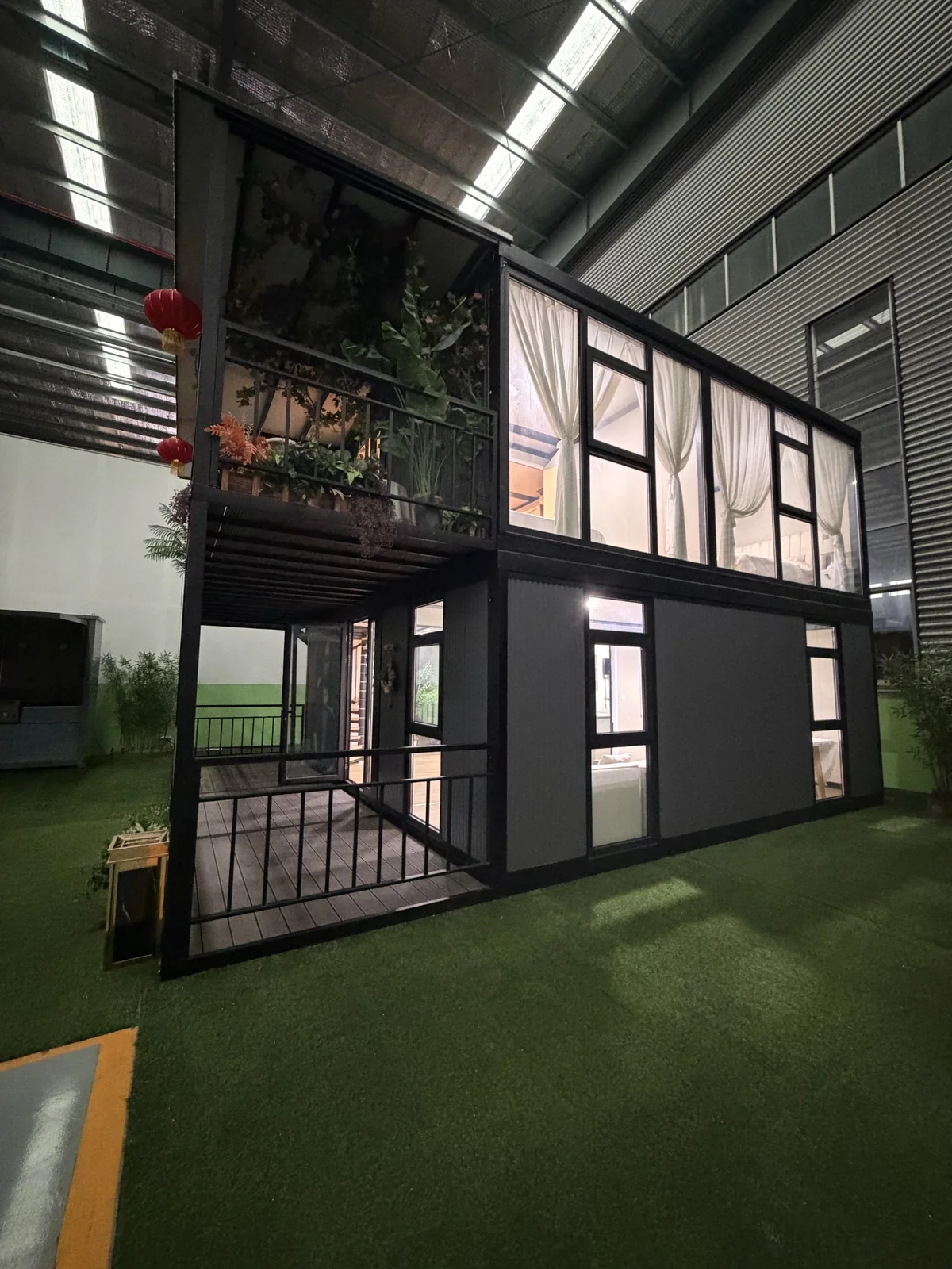 Side view of a real double-storey custom expandable container house