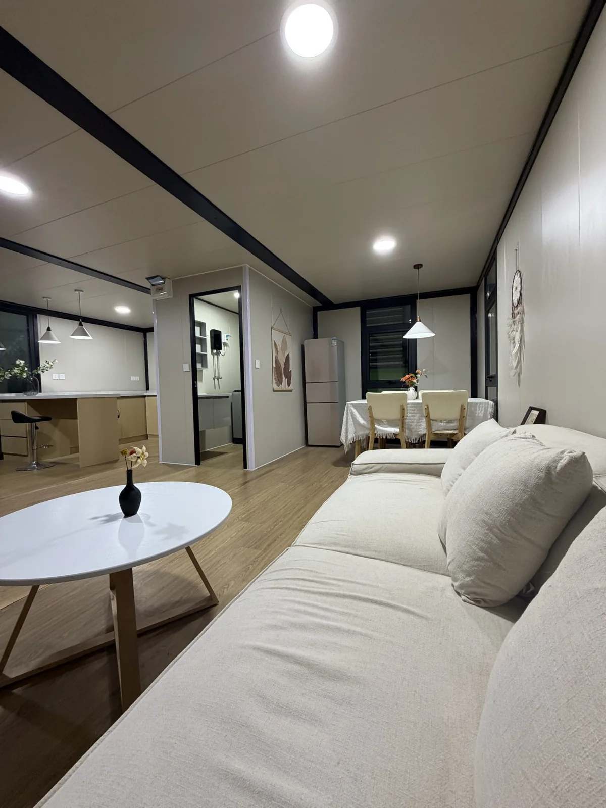 Living and dining space inside a real double-storey custom expandable house