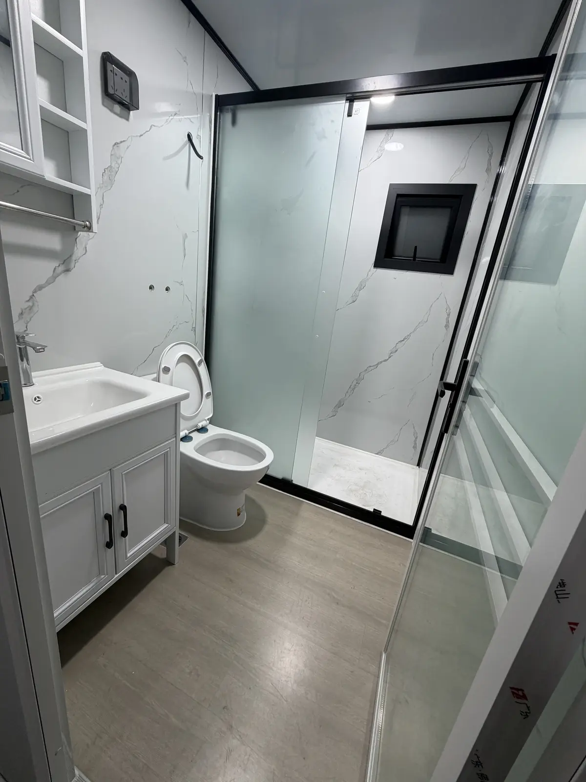 Finished bathroom inside a 20ft expandable container house