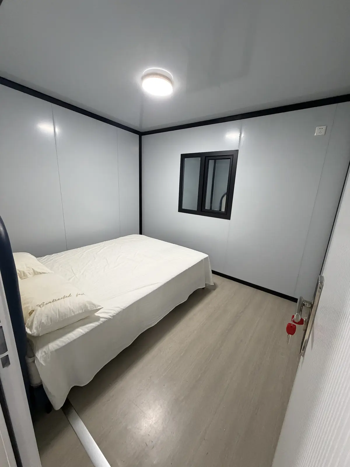 Finished bedroom inside a 20ft expandable container house