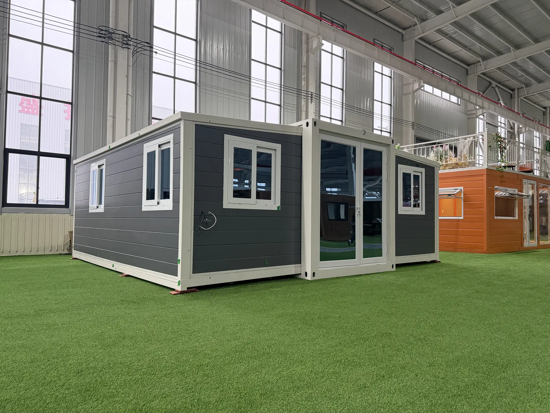 Charcoal 20ft expandable container house displayed in the factory