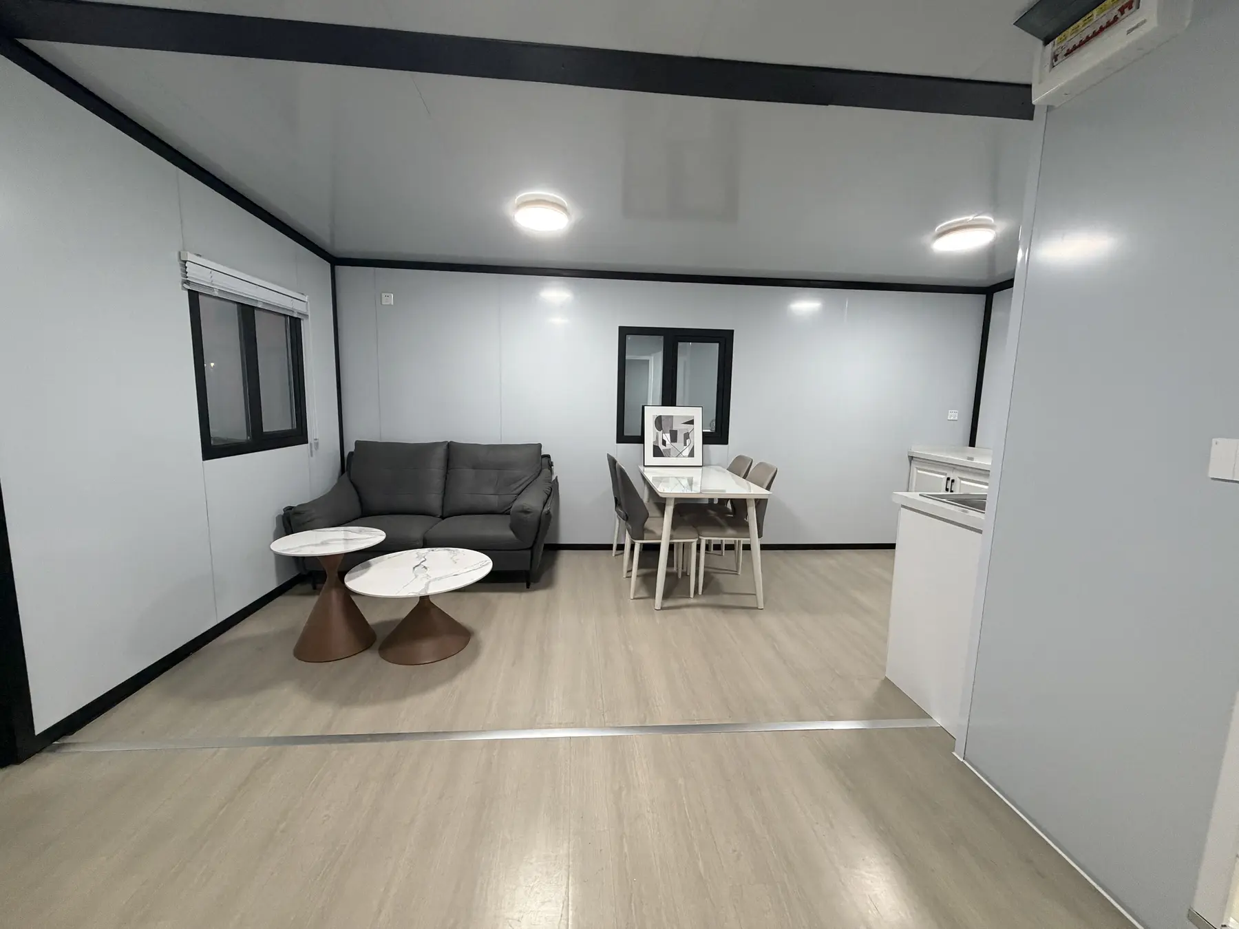 Wide living area inside a 20ft expandable house